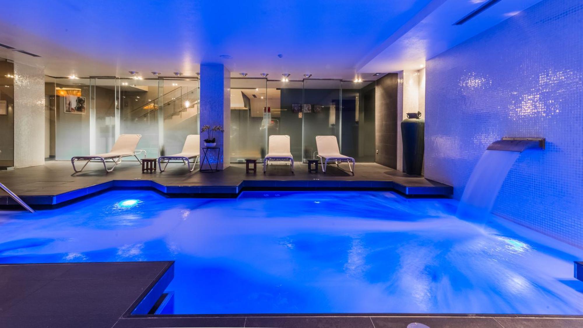 Attic terrace room includes one access to the spa per person per
